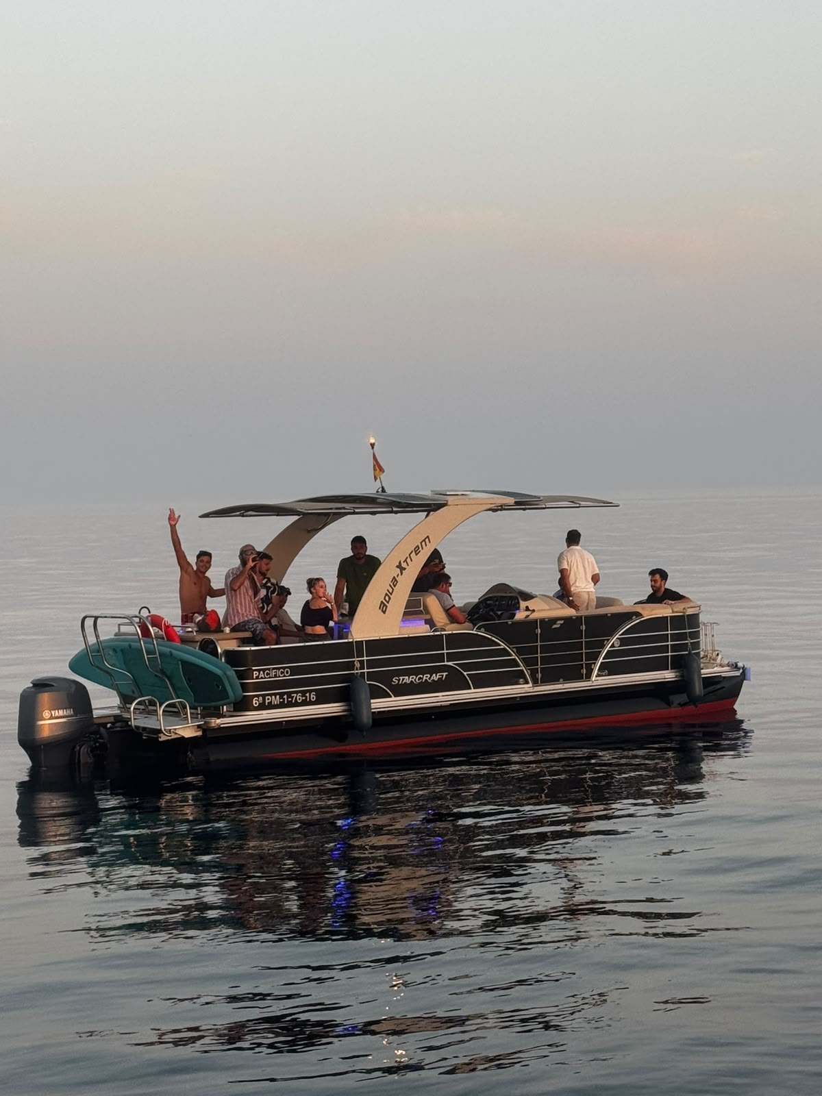 Group on board the Majestic at sunset